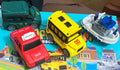 PULL BACK TRACTION TRAFFIC TEAM TOYS - TAXI, BUS, BOAT, AND MAIL DELIVERY